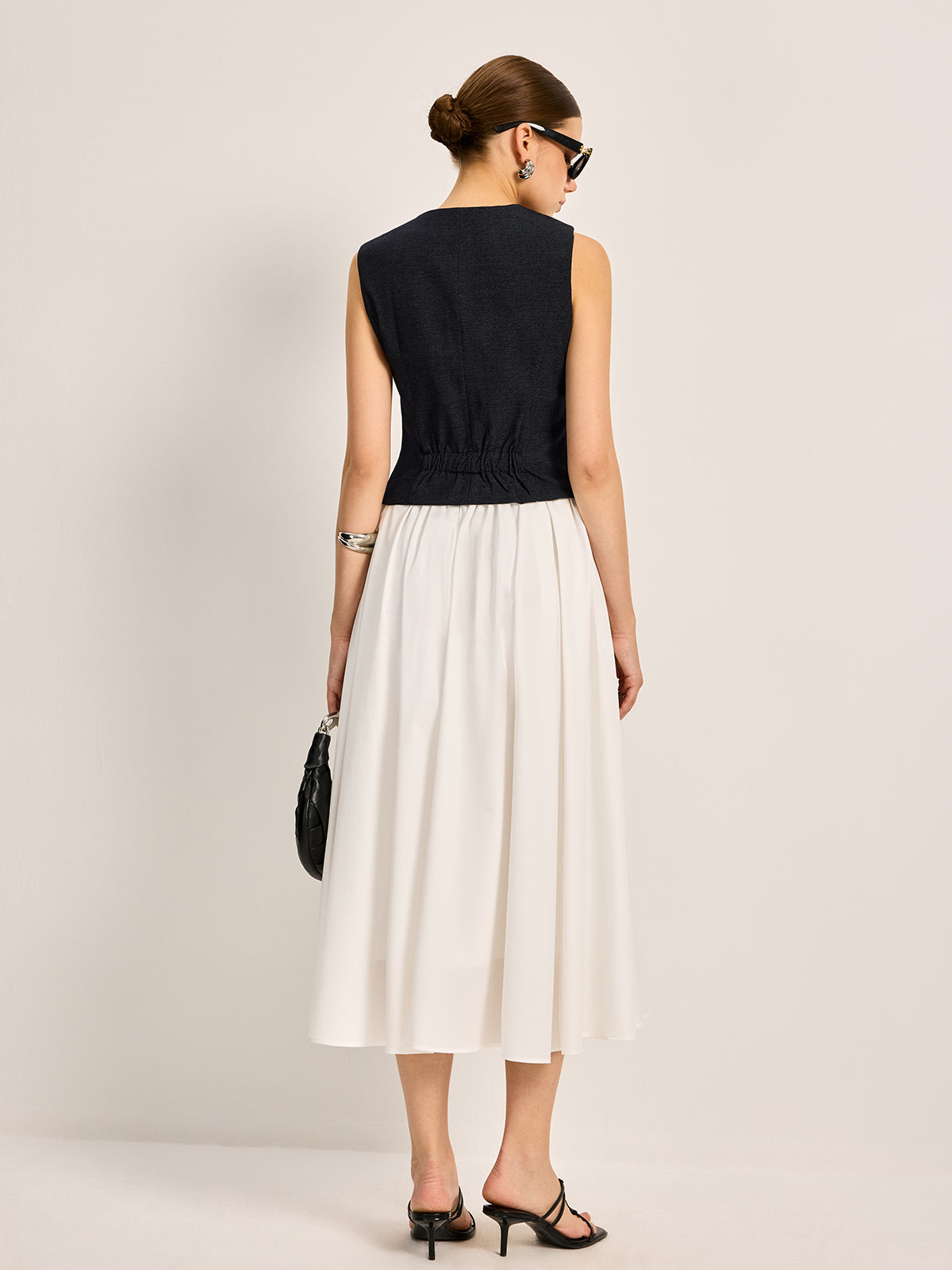 Mouwloos gilet met knoopdetail
