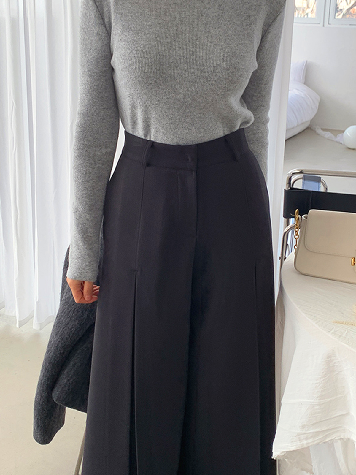 Pantalones anchos plisados de cintura alta