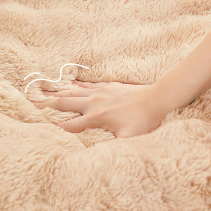 Cuddly, fluffy plush dog bed with pillow