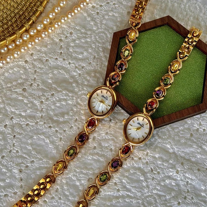 Ladies watch with gemstones and oval dial