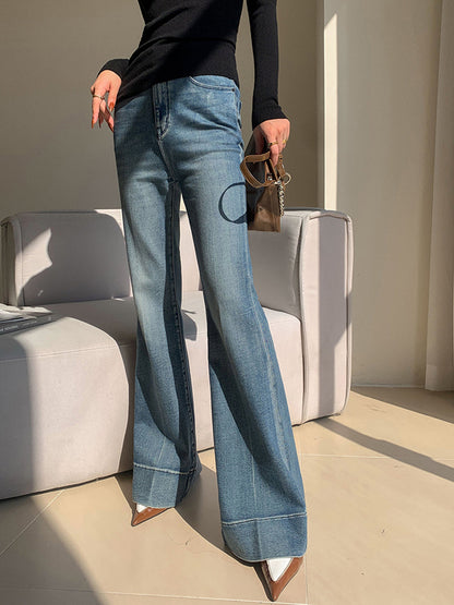 Pantalones de mezclilla ajustados y drapeados lavados