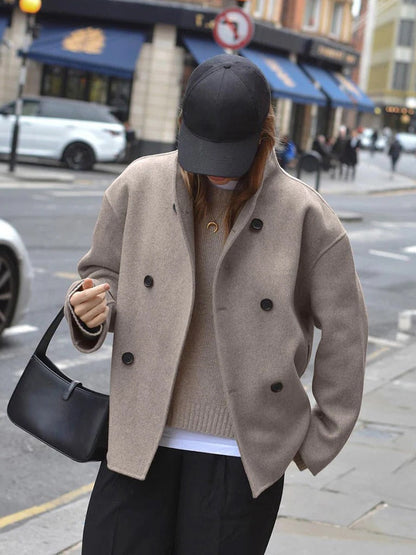 Women's jacket with stand-up collar and button closure