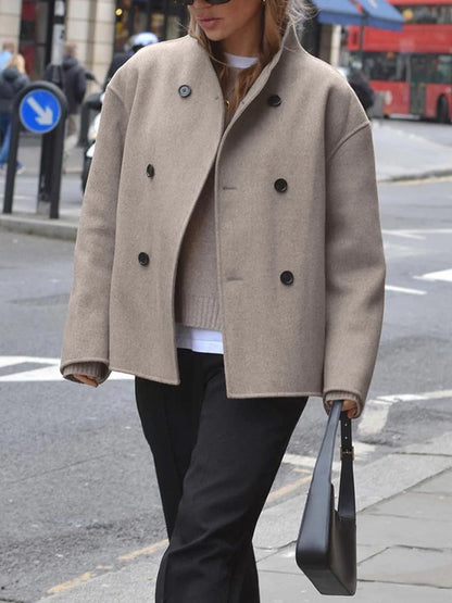 Women's jacket with stand-up collar and button closure