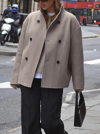 Women's jacket with stand-up collar and button closure